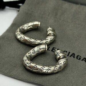 BALENCIAGA twist logo silver brass hoop earrings